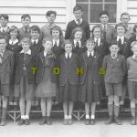 Black and white photo of students in school class photo