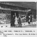 Black and white of 1930s shoe store in Traralgon, with owner and two staff standing out the front
