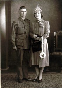 Historic photo of bride and groom, with groom wearing army uniform 1940