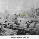 Historic photo of people at the Kornalla school 1906, background has many trees that look like they are recovering from a bushfire