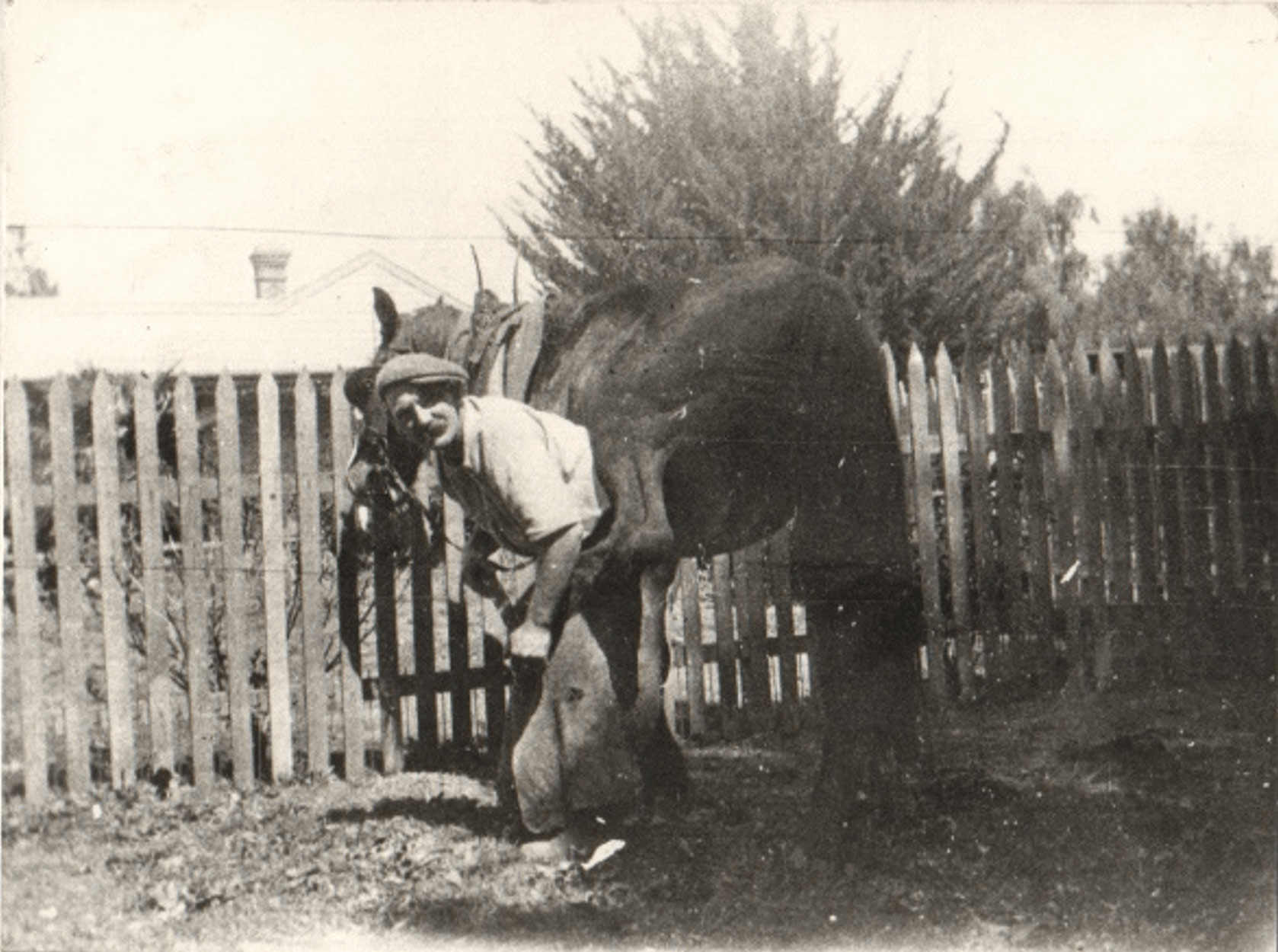 Historic photo of man with his horse