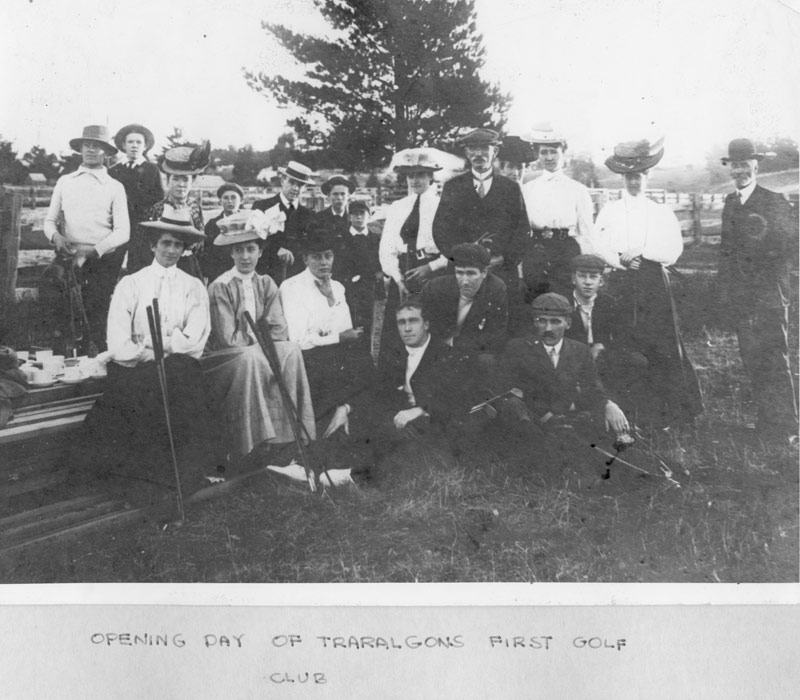 Historic photo of men and women at golfing day